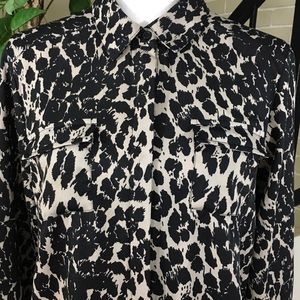 Animal print black & tan color blouse. Size PL.